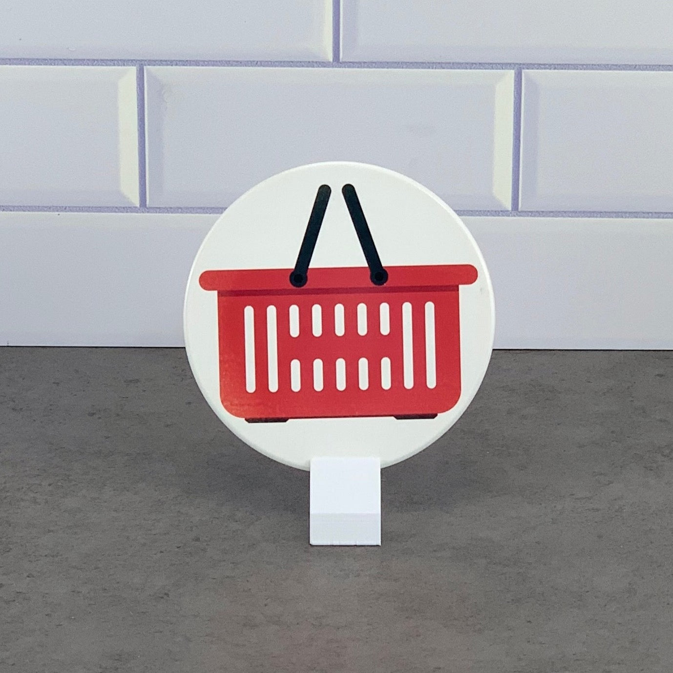 red shopping basket coaster